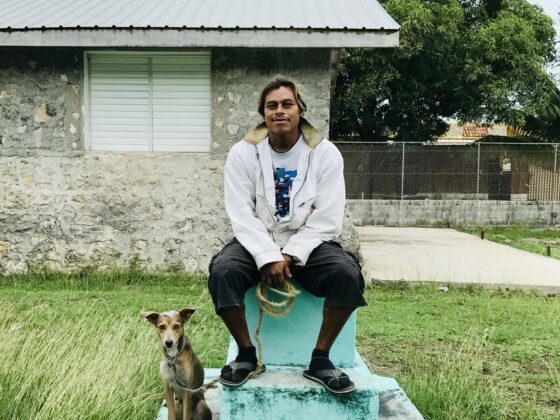 A villager and his dog at FVAI's clinic in Sarteneja, Belize