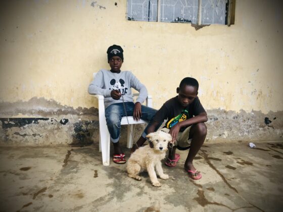 Kids and their dog at FVAI's clinic in Tanzania