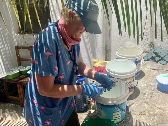 Washing surgical instruments under a blazing sun in Zanzibar